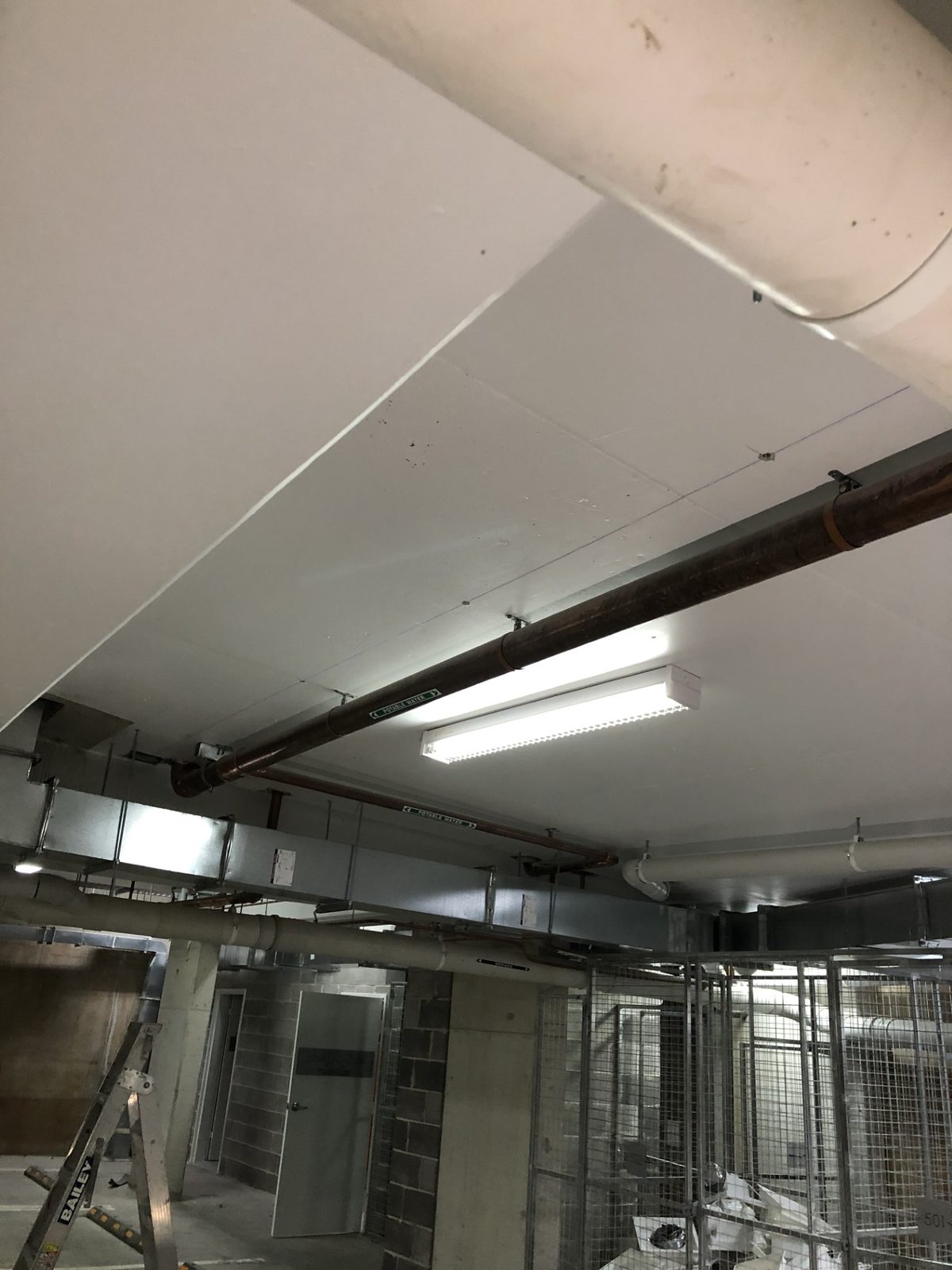 Plant room passive fire protection in a Sydney CBD commercial tower — fire-rated services register documentation